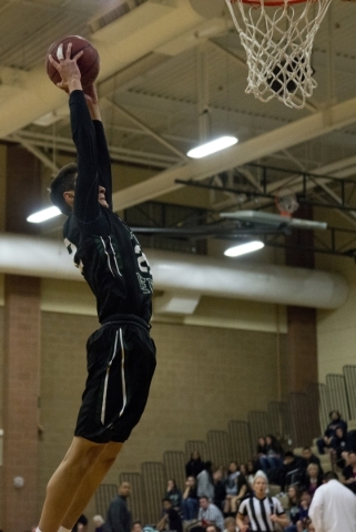 Palo VerdeÃ«s Taylor Miller (22) goes up for a dunk during their game against Legacy at Le ...