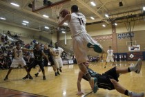 Legacy‘s Darious Dunson (11) passes the ball as he falls out of bounds during their ho ...