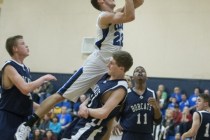 Calvary Chapel‘s Kilian Diers (22) goes up for a shot in the boy‘s basketball ga ...