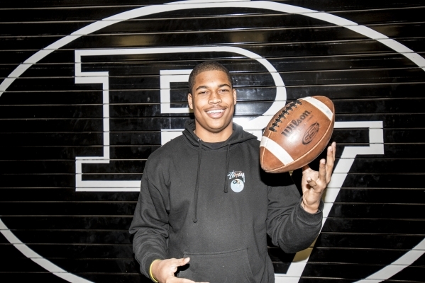 UNR football commit Kameron Toomer poses for a photo in the Palo Verde High School weight ro ...