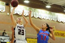 Faith Lutheran guard Bryanna Neagle (23) goes up for a shot against Western forward Destiny ...