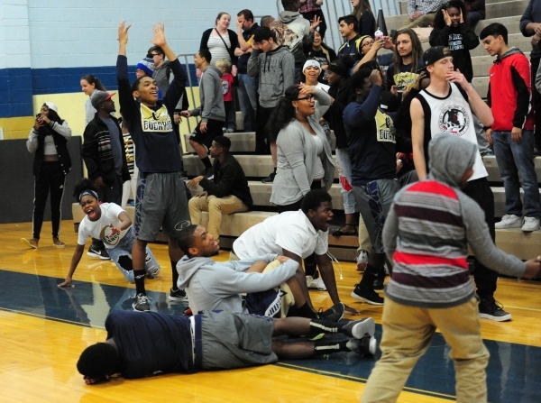 Stunned Cheyenne fans react at the end of the third overtime during their prep basketball ga ...