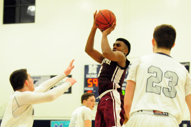 Agassi Prep forward Daniel Plummer (4) makes the game winning field goal with seconds remain ...