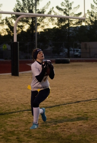 Boulder City‘s Makenzy Waldo (4) catches the ball in the end zone during their game ag ...