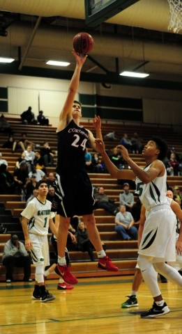 Coronado forward Jake Desjardins (24) goes up for a shot against Green Valley forward Isiah ...