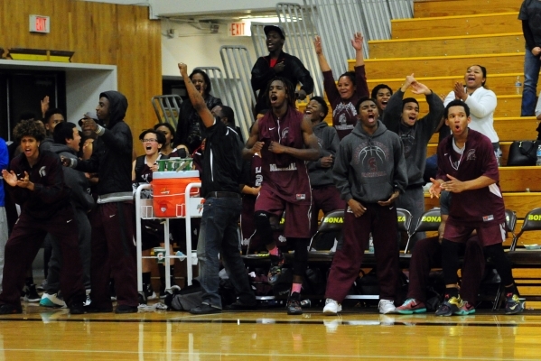 The Cimarron-Memorial racts after Ja‘Don Brown (20) hit the game winning free throw in ...