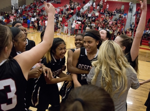 Desert Oasis center Dajaah Lightfoot (35) is congratulated after a game-winning free throw d ...