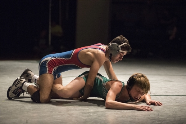 Valley‘s Ulises Munguia, left, wrestles Green Valley‘s Tyler Dockery during thei ...