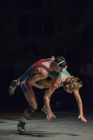 Valley‘s Ulises Munguia, left, wrestles Green Valley‘s Tyler Dockery during thei ...