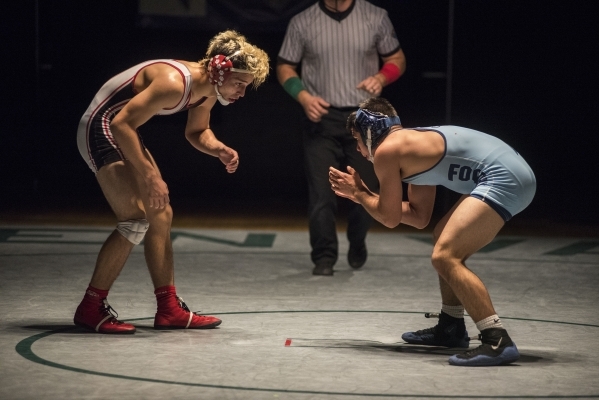 Las Vegas High‘s Nick Saban, left, wrestles Foothill‘s Jacob Chavez during their ...