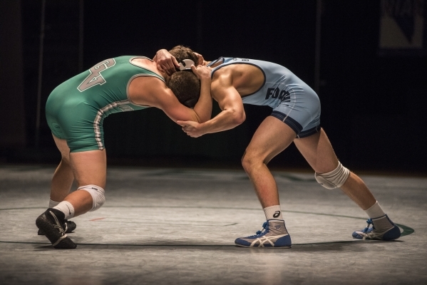 Green Valley‘s Cody Chamberlin, left, wrestles Foothill‘s Wyatt English during t ...