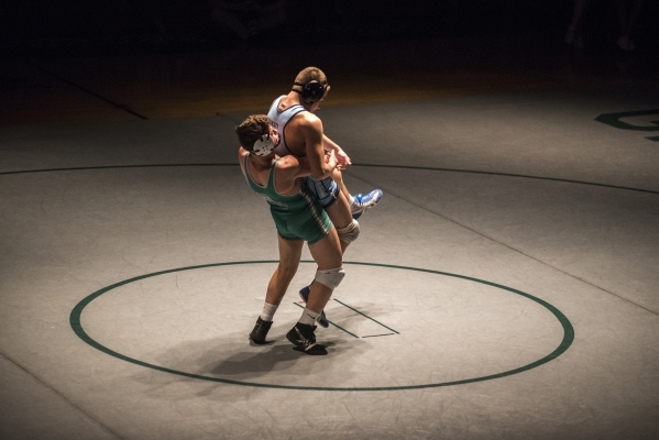 Green Valley‘s Cody Chamberlin, left, wrestles Foothill‘s Wyatt English during t ...