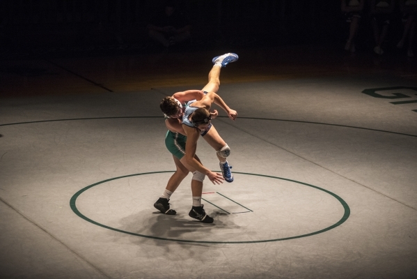 Green Valley‘s Cody Chamberlin, left, wrestles Foothill‘s Wyatt English during t ...