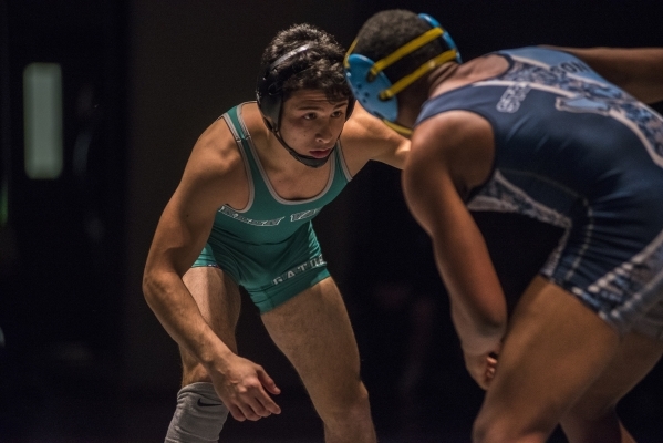 Green Valley‘s Giullian Nakamatsu, left, wrestles Canyon Spring WIlliam Stevenson duri ...