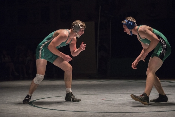 Green Valley‘s Jared Temple, left, wrestles Rancho‘s Alex Arone during their 170 ...