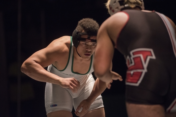 Green Valley‘s Sal Hicks, left, wrestles Las Vegas High‘s Cruz Littlefield durin ...