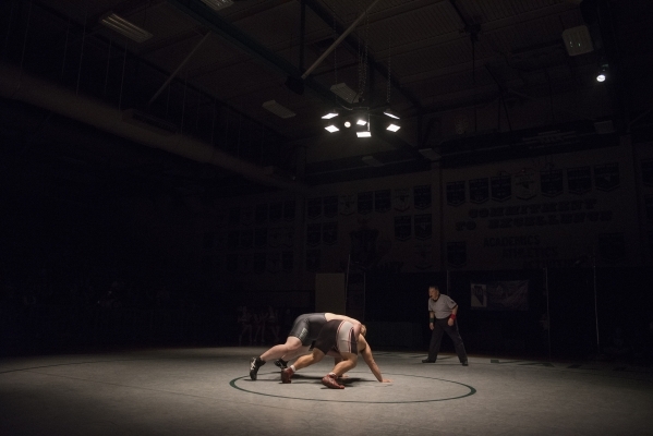 Green Valley‘s Anthony Valenti, left, wrestles Las Vegas High‘s Robby Kaempfer d ...