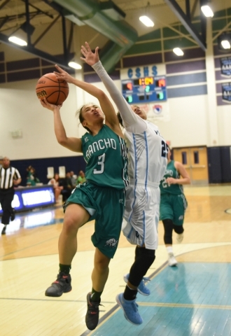 Rancho‘s Maureen Macato (3) goes up for a shot against Canyon Springs D‘Licya Fe ...