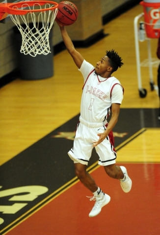 Desert Oasis guard Leslie Long goes up for a shot against Legacy in the fourth quarter of th ...