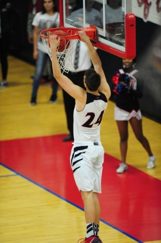 Coronado forward Jake Desjardins (24) dunks against Silverado in the fourth quarter of their ...