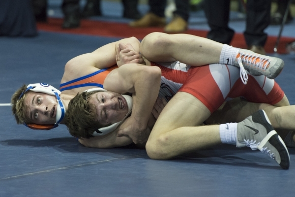 Mason Campbell, back, of Bishop Gorman High School wrestles Dawson Downing of Arbor View Hig ...