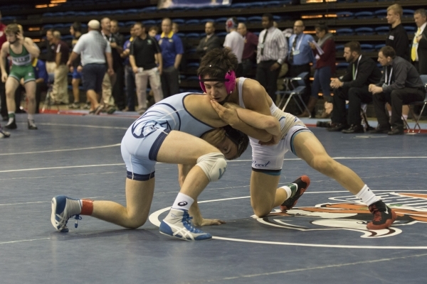 Israel Casarez, right, of Reed High School wrestles Wyatt English of Foothill High School at ...