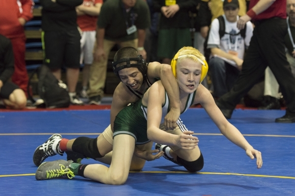 Anthony Martinez, left, of Spring Mountain High School wrestles Jake Legarza of Battle Mount ...