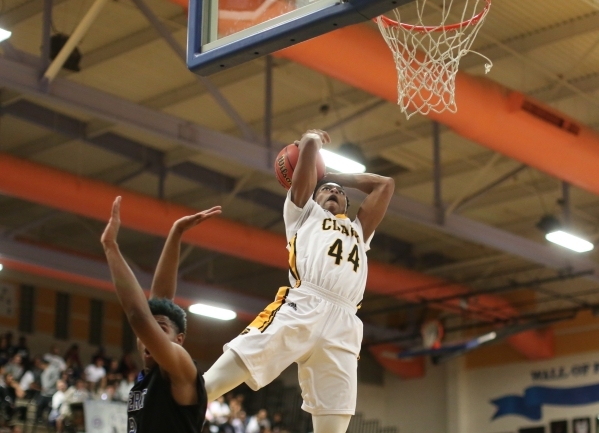 Clark High School senior Darius Jackson (44) shoots the ball over Desert Pines High School j ...