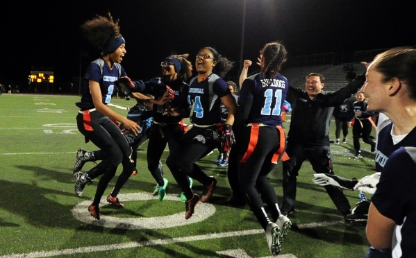 Centennial players celebrate their 25-20 victory over Foothill in the CCSD Division I Flag ...