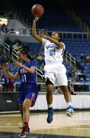 Centennial‘s Justice Ethridge shoots over Reno‘s Daranda Hinkey during the NIAA ...