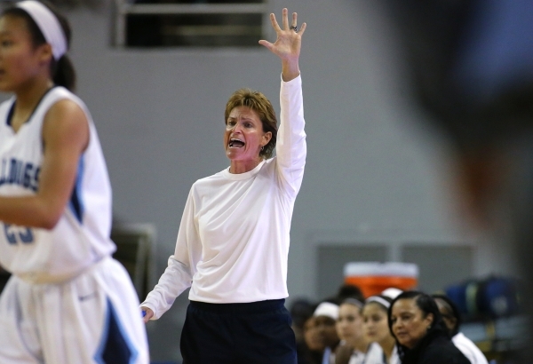 Centennial Head Coach Karen Weitz works the sidelines of a game against Reno during the NIAA ...