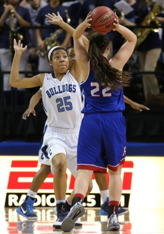 Centennial‘s Samantha Thomas defends against Reno‘s Mckain Murdock during the NI ...