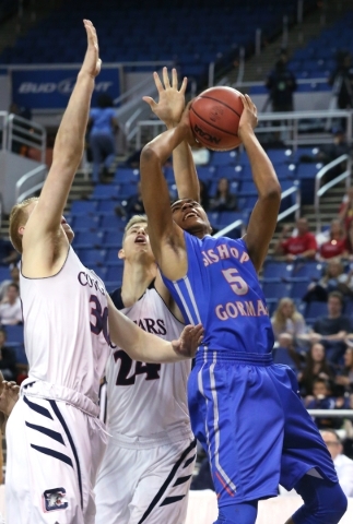 Bishop Gorman‘s Chuck O‘Bannon shoots under pressure from Coronado defenders Ken ...