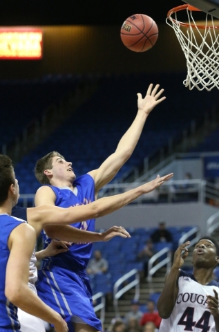 Bishop Gorman‘s Byron Frohnen shoots over Coronado‘s Tiaeem Comeaux during the N ...