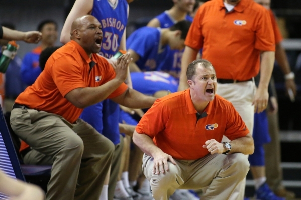 Bishop Gorman Head Coach Grant Rice works the sidelines of the NIAA Division I state basketb ...