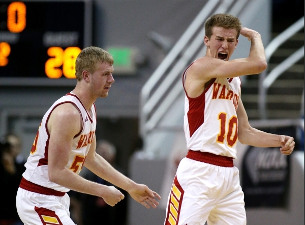 Whittell‘s Quinn Kixmiller, left, and Palmer Chaplin celebrate a shot at the buzzer at ...