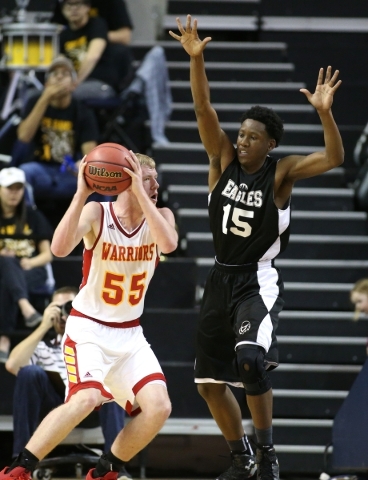 Whittell‘s Quinn Kixmiller looks to shoot around Word of Life Malik Moore during the N ...