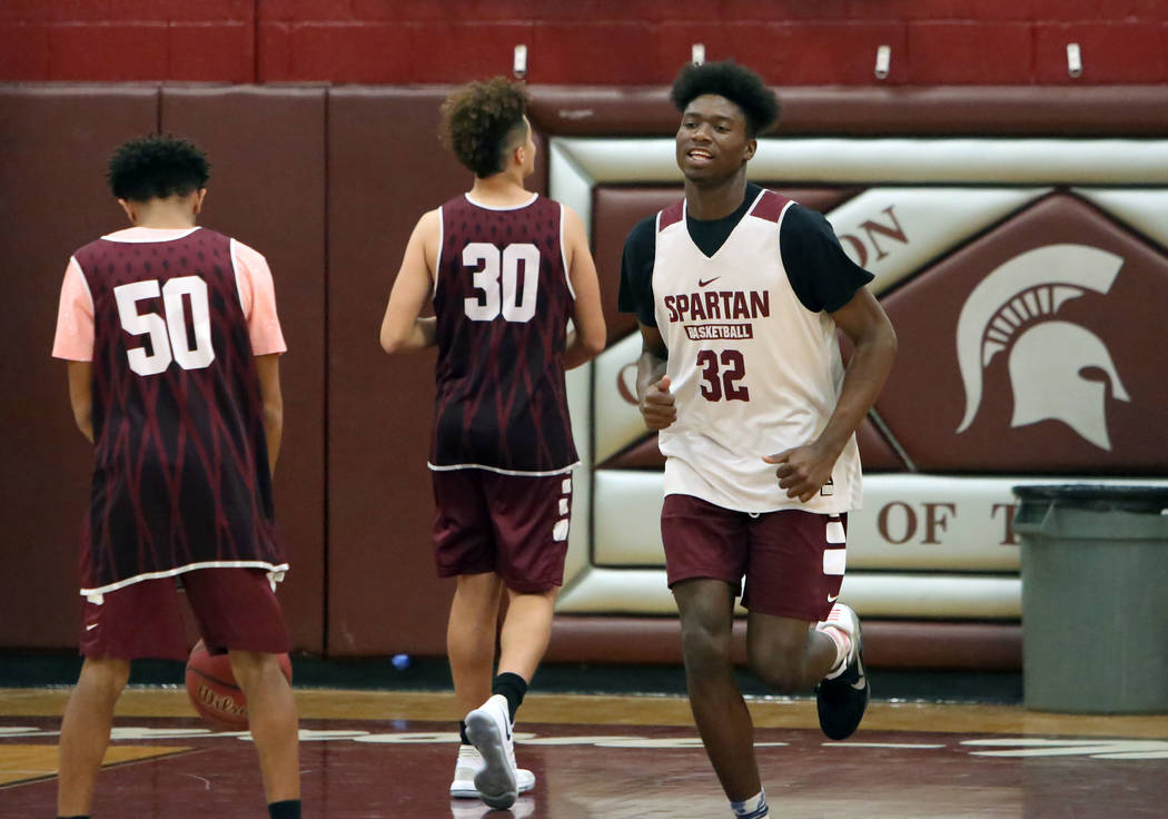 Cimarron-Memorial’s Brian Washington (32) warms up during teams practice at their scho ...