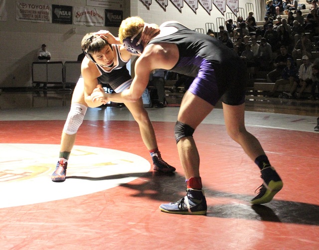 Centennial’s Nico Antuna, left, ties up with Durango’s Kaden Renshaw during thei ...