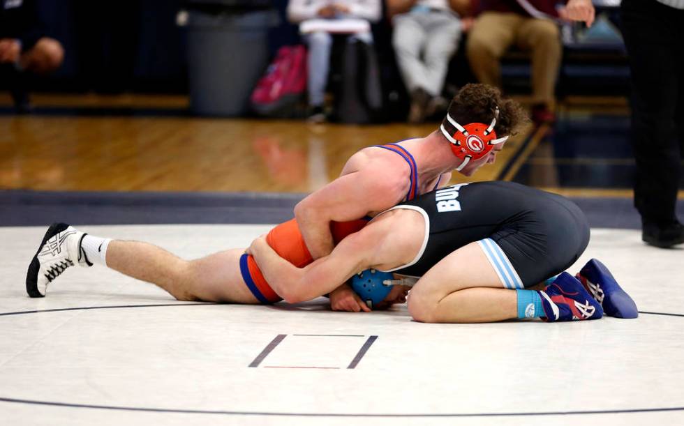 Joey Mazzara, of Bishop Gorman High School, pins down his opponent on Saturday during the Su ...