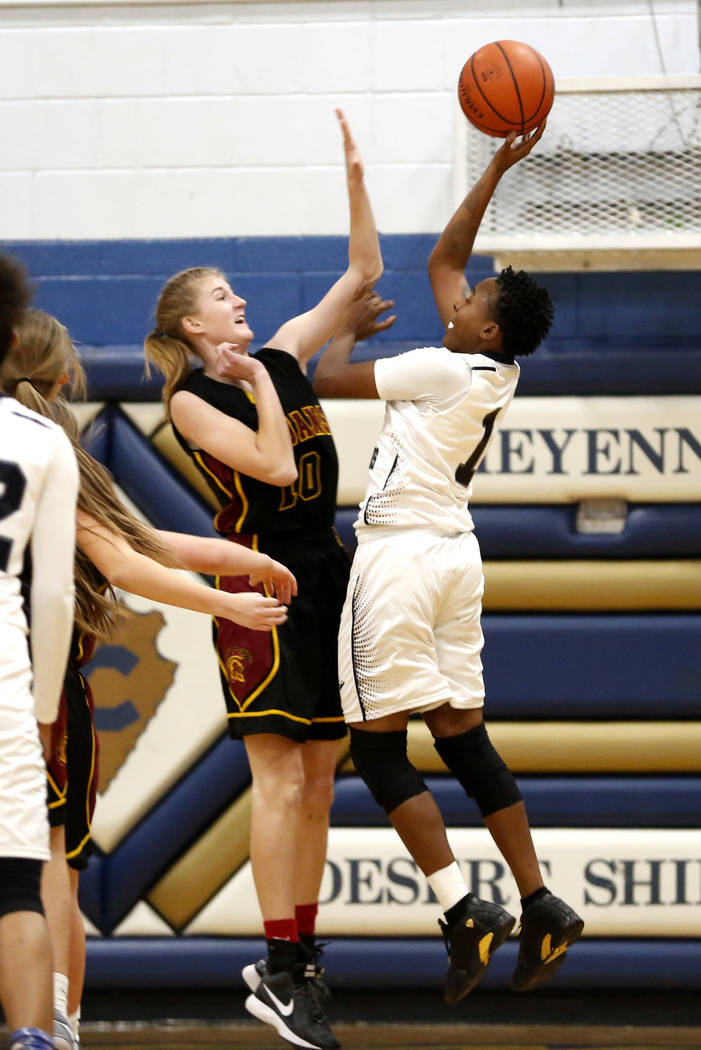 Cheyenne High’s Shanice Aycox (1) throws the ball against Pahrump Valley’s Sam R ...