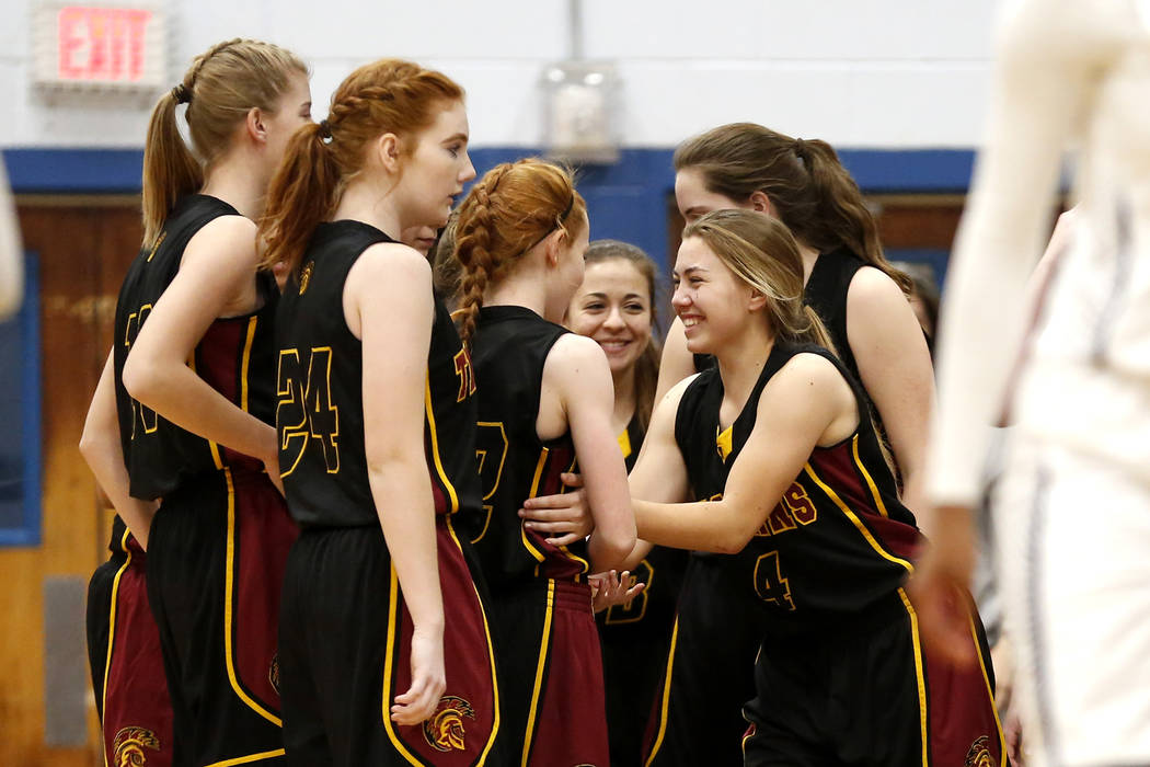 Pahrump Valley’s Skyler Lauver (4) celebrates a teammate’s play against Cheyenne ...