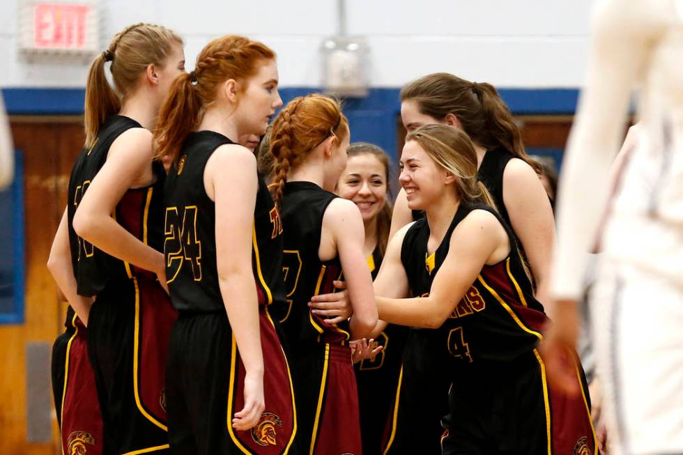 Pahrump Valley’s Skyler Lauver (4) celebrates a teammate’s play against Cheyenne ...