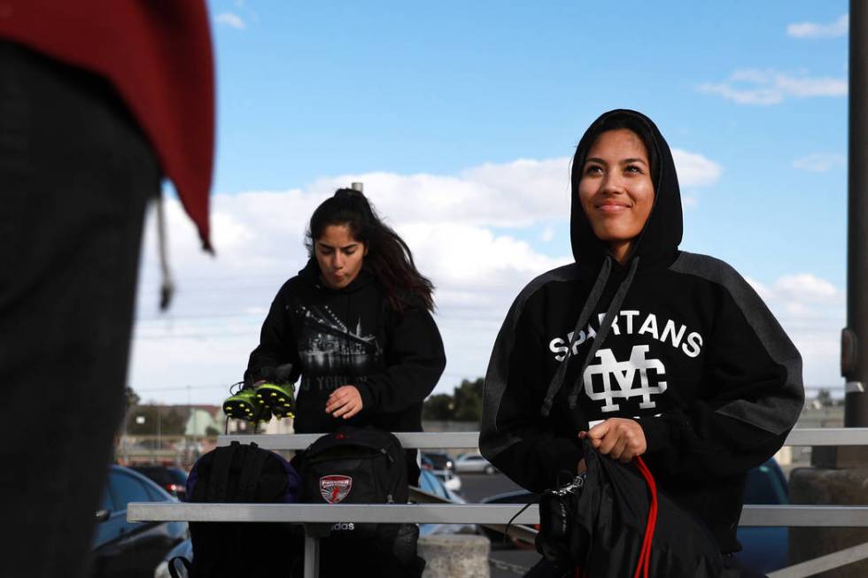 Tiarra Del Rosario, one of the best flag football players in the state, talks to a friend af ...