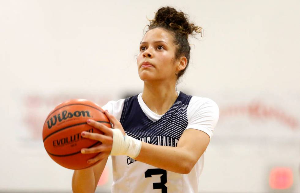 Spring Valley’s Essence Booker (3) prepares to shoot the ball during a girl’s ba ...