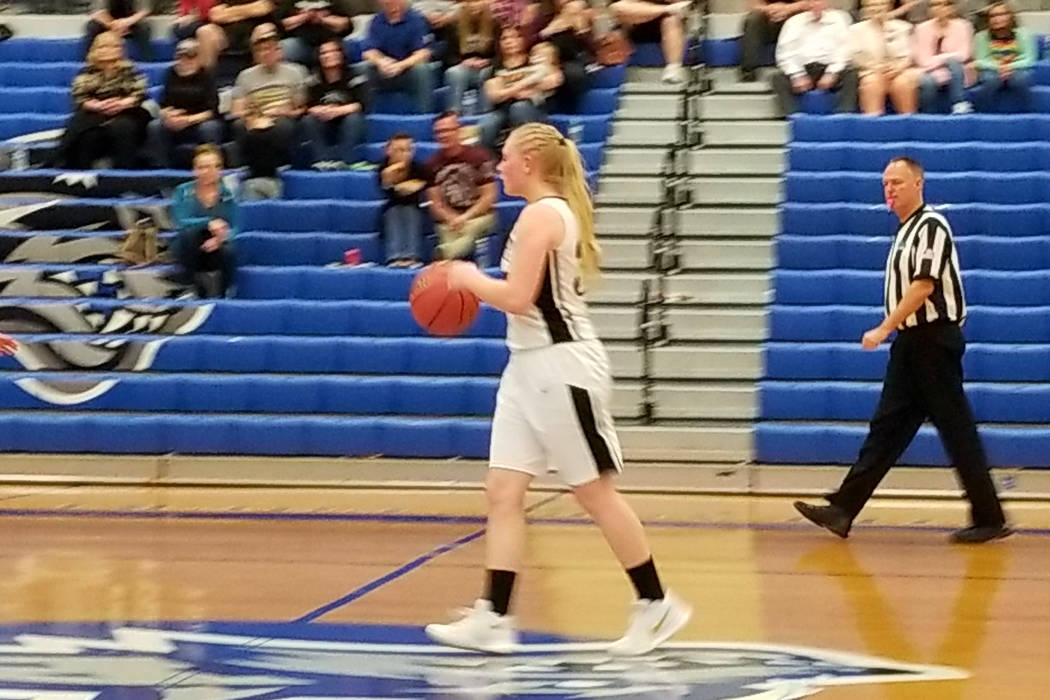 Round Mountain’s Tia Sample brings the ball up the court against Tonopah on Friday, Fe ...