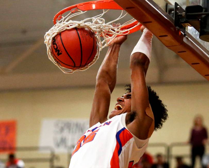 Bishop Gorman’s Jamal Bey (35) dunks the ball against Clark during the Sunset Region b ...