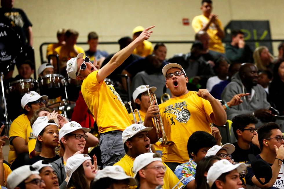 Fans cheer during the Sunset Region boys basketball championship at Legacy High School in No ...