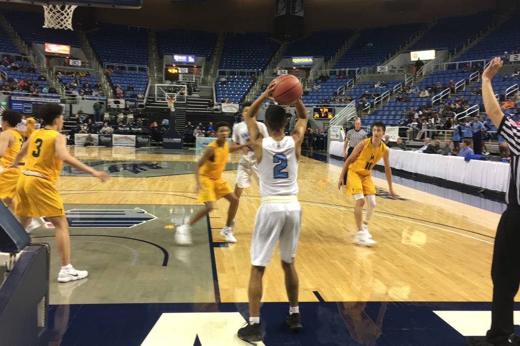 Alexander Spaight inbounds the ball against Bishop Manogue in the Class 4A state semifinals ...