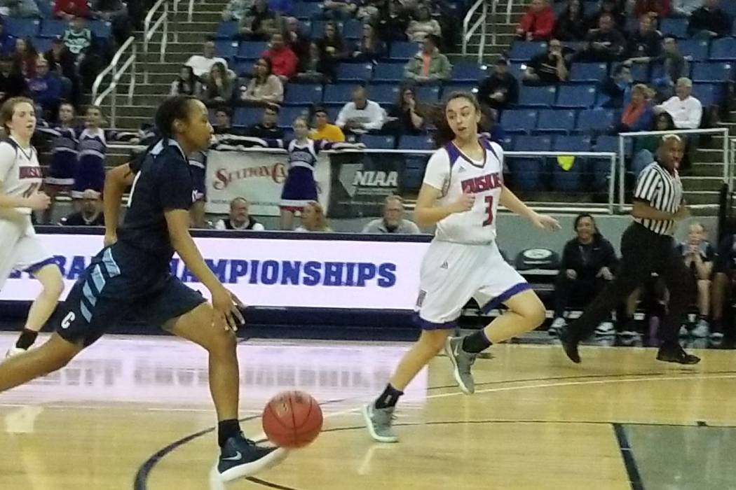 Centennial’s Justice Ethridge drives to the basket against Reno’s Hana Hackbush ...